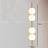 Серия подвесных светодиодных светильников со стеклянными шарообразными плафонами, собранными на латунной стойке VOKE 2 лампы фото 5