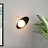 Настенный светильник каплевидной формы с шарообразный стеклянным плафоном внутри металлического эллипса ULTIMA фото 7
