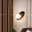 Настенный светильник каплевидной формы с шарообразный стеклянным плафоном внутри металлического эллипса ULTIMA фото 6